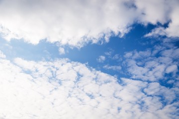 Blue sky with cirrocumulus clouds. Sky background