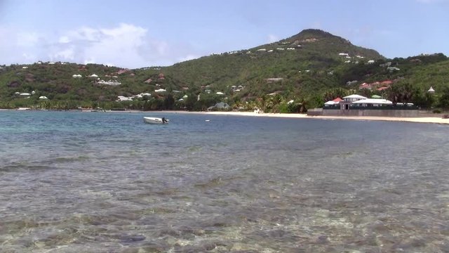Anse de Lorient Bay on Saint Barth&eacute;lemy Island in the Caribbean with Green Mountains, Blue Sea and Sandy Beach