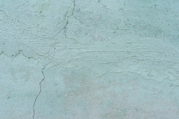 Texture, wall, concrete, it can be used as a background. Wall fragment with scratches and cracks
