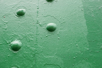 water dold rivets on the sheet metalrops on glass