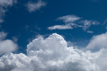 Cumulus clouds shot through a polarize filter for great contrast and deep blue sky. 