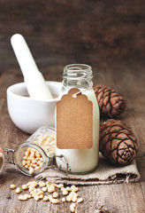 cedar milk in a bottle