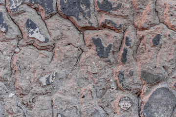 Texture, wall, concrete, it can be used as a background. Wall fragment with scratches and cracks