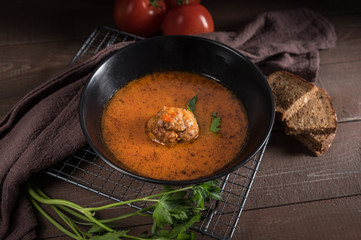 Meatballs in sweet and sour tomato sauce