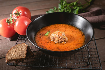 Meatballs in sweet and sour tomato sauce