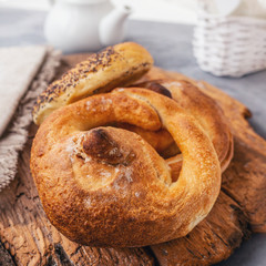 Russian national bread Kalach on a wooden background. National bread products