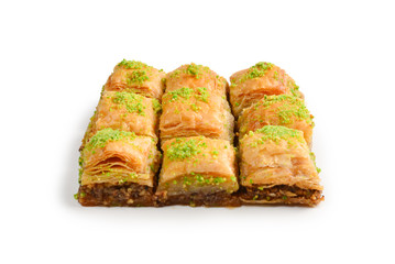 Pistachio baklava on a white background. Dessert.