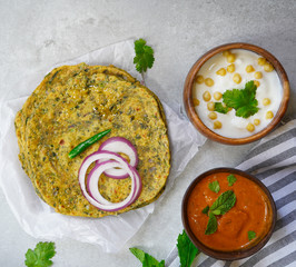 Gujarati Methi Thepla - Indian flatbread Paratha with fenugreek leaves, selective focus