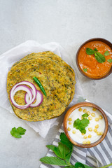 Gujarati Methi Thepla - Indian flatbread Paratha with fenugreek leaves, selective focus