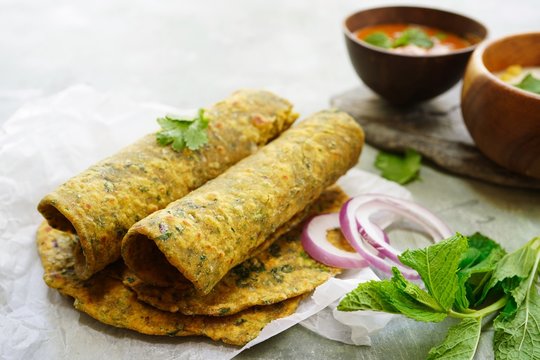 Gujarati Methi Thepla - Indian flatbread Paratha with fenugreek leaves, selective focus