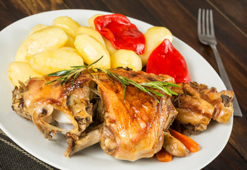 Cordero asado con patatas