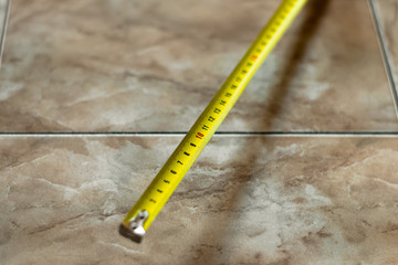 Construction Roulette. Measuring tool. Tape measure. Yellow roulette