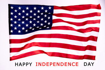 American flag background for Memorial Day or 4th of July with copy space. Or Independence Day background. Beautifully waving star and striped American flag.