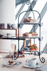 Beautiful english afternoon tea ceremony with desserts