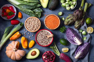 Healthy food clean eating selection, vegan ingredients, fresh vegetables und legumes, quinoa, lentils, chickpeas, vegetarian cooking