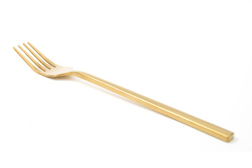 golden fork isolated on a white