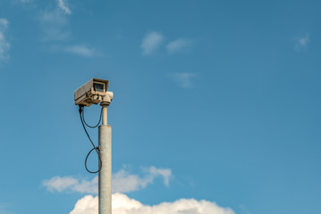 Video surveillance security CCTV camera installed along the street