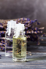 Lavender flowers and herbal oil. Selective focus.