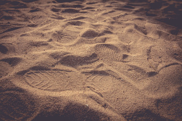 Sand backgrond with foot mark