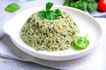Spinach Rice on a Plate over Bright Background
