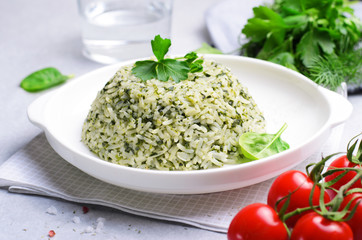 Spinach Rice on a Plate over Bright Background