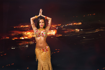 Young woman performing belly dance