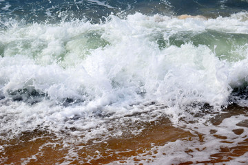 Sea foam. A spray of water. Sea coast.