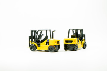 Two Diesel forklift on white background