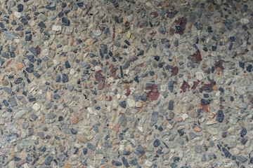 The stone floor is decorated with many pieces