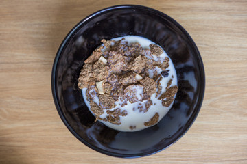 Breakfast chocolate cornflakes cereal milk