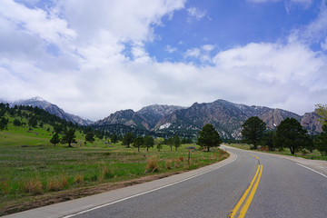 Driving on the road in the Rocky Mountains in Boulder, Colorado