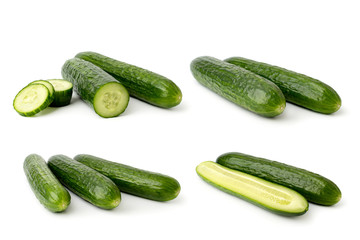 Set of ripe cucumbers on a white background.