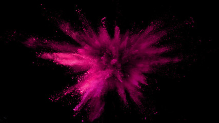 Explosion of colored powder isolated on black