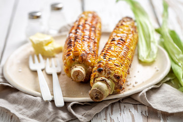 Hot and delicious corncob with salt and butter in summer