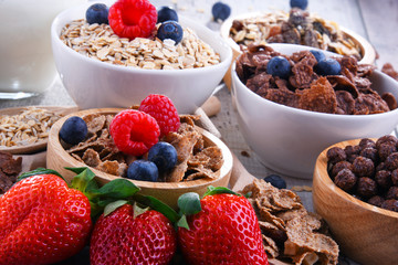 Bowls with different sorts of breakfast cereal products