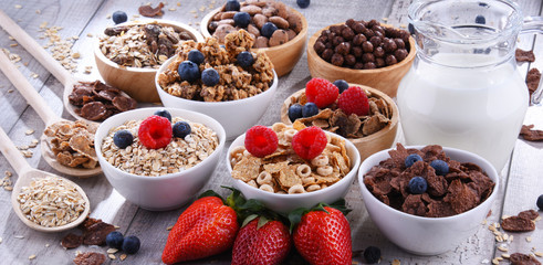 Bowls with different sorts of breakfast cereal products