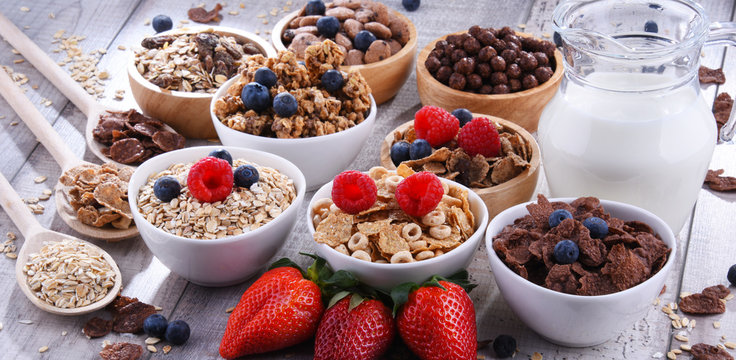 Bowls with different sorts of breakfast cereal products