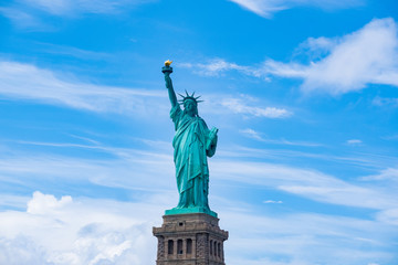 Fototapeta premium The Statue of Liberty in New York City , with cloudy background ,