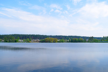 Beautiful view of the lake and forest in the distance.Nature in summer.