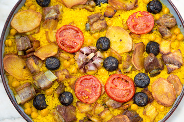 Close-up of baked rice casserole with ribs.