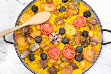 Close-up of baked rice casserole with ribs.
