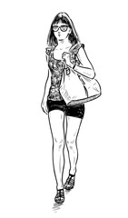 A young girl strolls in a hot summer day