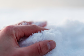 Fototapeta premium hand with snow