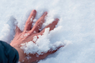 hand with snow