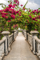 Bridge with rose terrace to Gili Bale in Ujung Water Palace (Ujung Park or Sukasada Park) on Bali, Indonesia