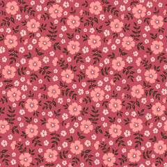 Seamless ditsy floral pattern in vector. Small pink flowers on a red background.