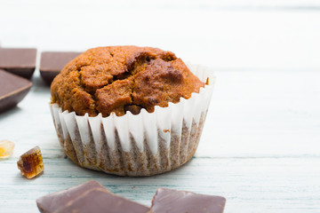 chocolate cupcakes, old white wooden table