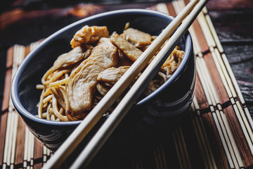 Asian noodles with chicken meat