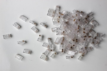 a bunch of rj-45 8P8C internet connectors on a white background