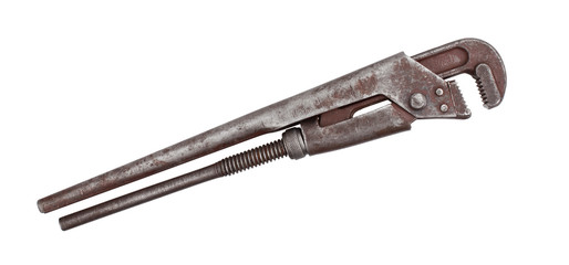 Old rusty alligator wrench isolated on white background